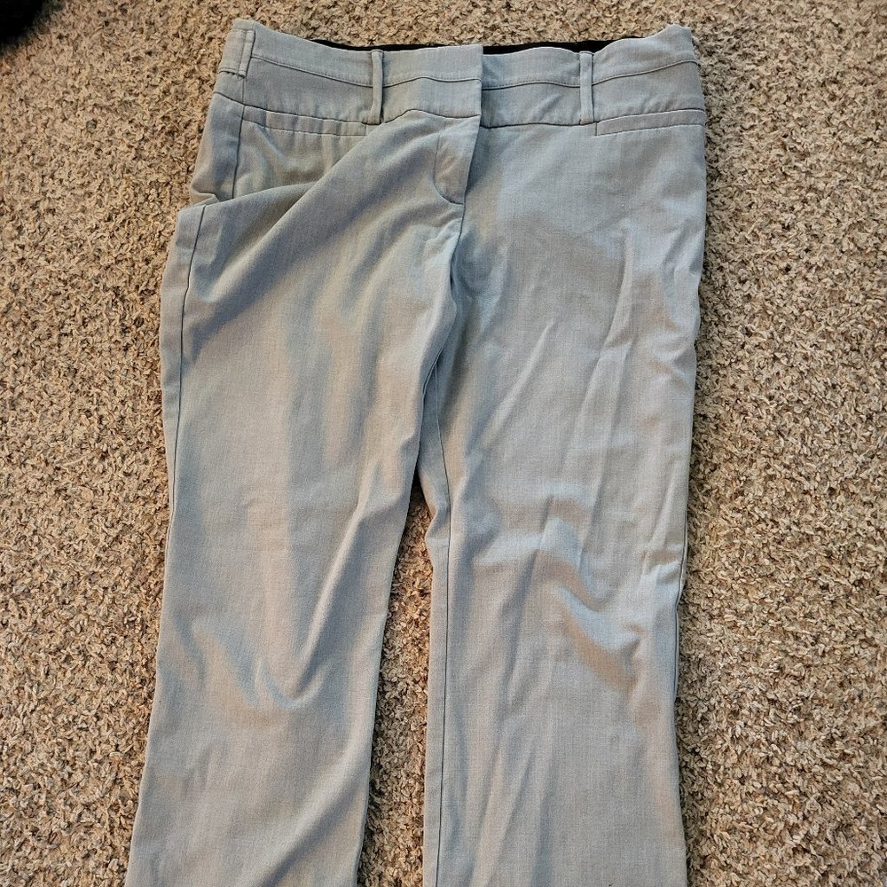 Maurice's gray slacks